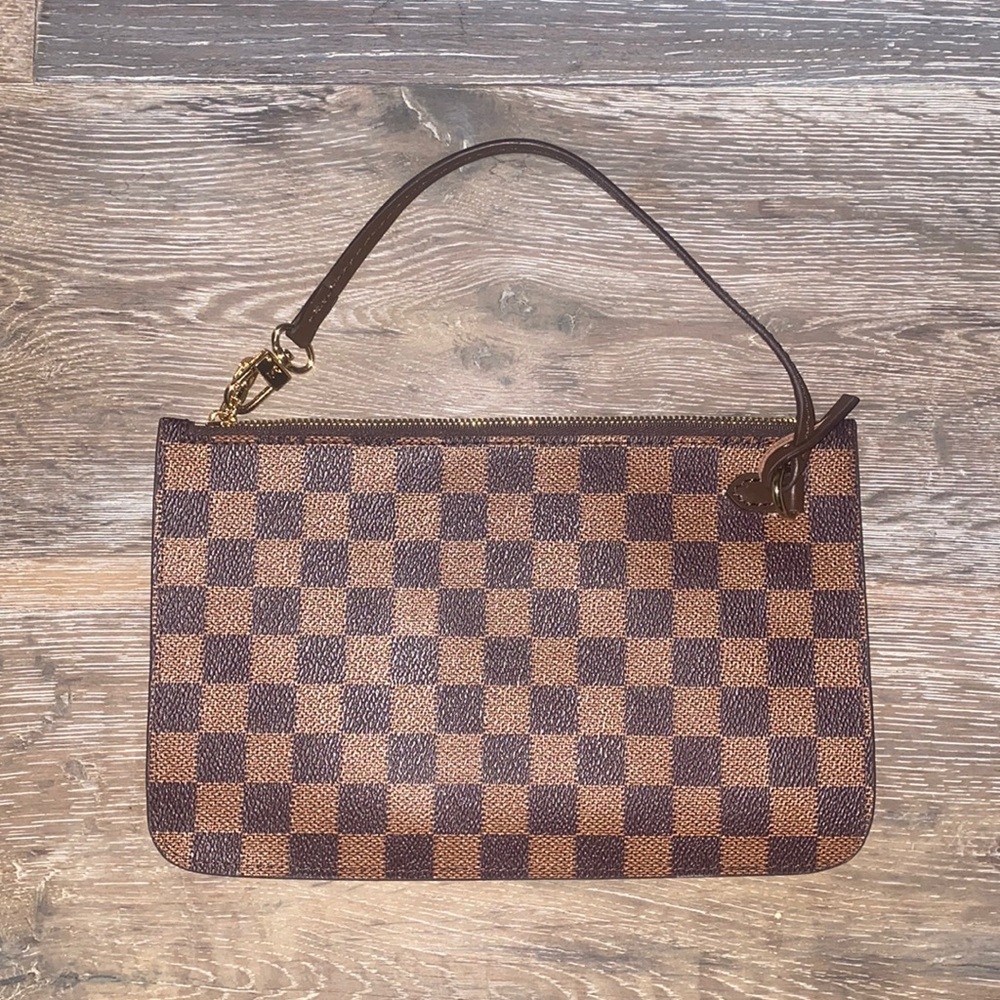 Small Louis Vuitton purse with chain. Brand new.